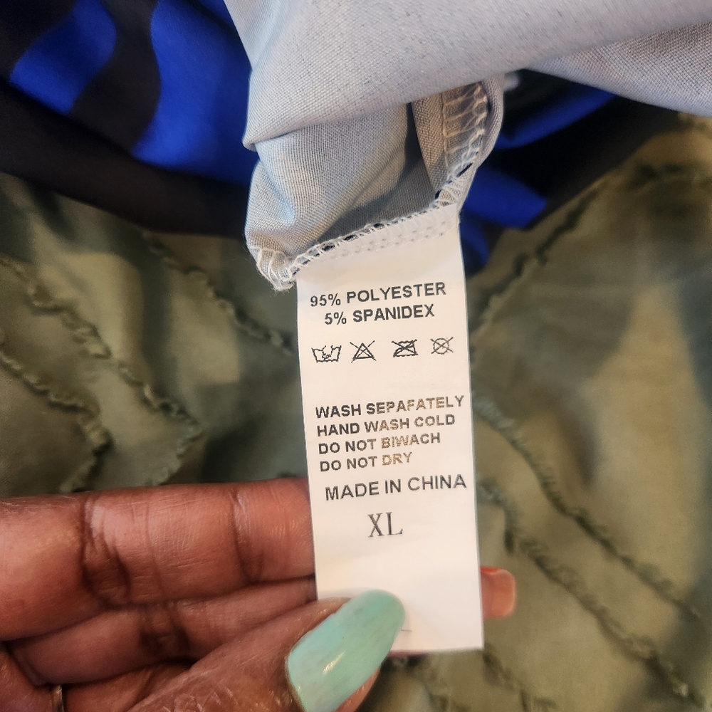 Nice Fashion blue and black jumpsuit. Patterns have circles and stripes. - Picture 2 of 10